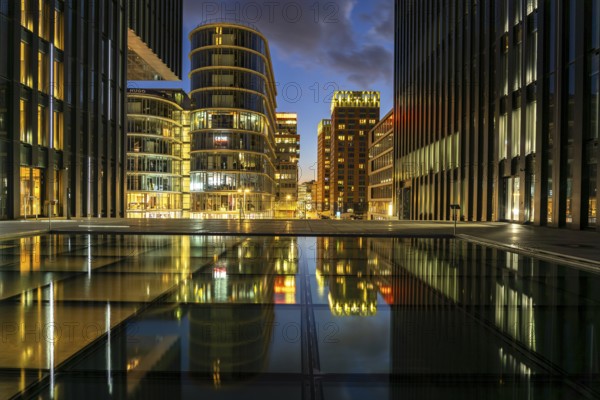 Modern high-rise architecture in the Media Harbour quarter in Düsseldorf at dusk, North Rhine-Westphalia, Germany, Europe