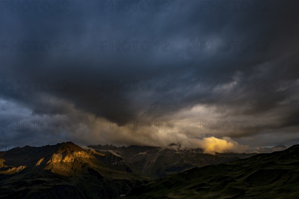Montafon mountains with dramatic cloudy sky at sunset, Tschagguns, Rätikon, Montafon, Vorarlberg, Austria, Europe