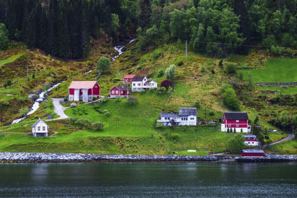 Mountains and Fjord over Norwegian Village, Olden, Innvikfjorden, Norway, Europe