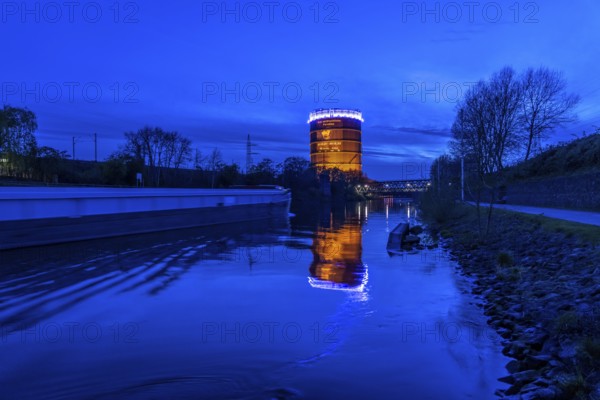 Neue Mitte Oberhausen, Gasometer exhibition hall, after renovation, Rhine-Herne Canal, evening lighting, exhibition The Fragile Paradise, North Rhine-Westphalia, Germany, Europe