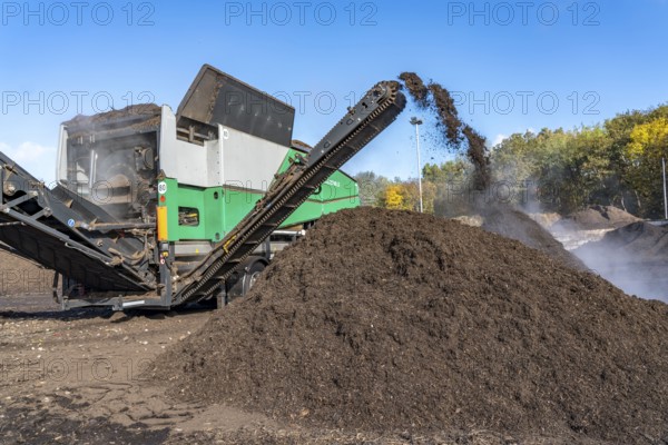 Composting plant, organic waste is composted, sorted by size, smaller parts are reused as compost, coarser parts are burnt in a biomass power plant and converted into electricity, Coesfeld, North Rhine-Westphalia, Germany, Europe