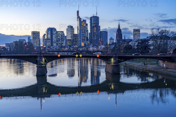 Skyline of the city centre of Frankfurt am Main, river Main, dusk, Ignatz-Bubis-Brücke, Hesse, Germany, Europe