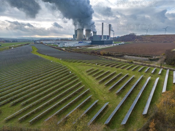 Solarpark Inden, a photovoltaic park in Inden, at the Weisweiler lignite-fired power plant of RWE Power AG in Eschweiler-Weisweiler, base load power plant, burns lignite from the Inden opencast mine, North Rhine-Westphalia, Germany, Europe