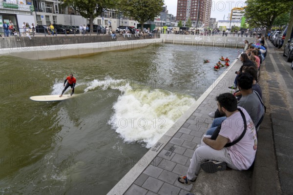 Surfing facility in the city centre of Rotterdam, Rif010, supposedly the world's first wave facility for surfers in a city, in the Steigersgracht, a 130 metre long and 21 metre wide wave pool was built in the existing canal, waves up to 1.5 metres high can be generated, every 7 seconds a wave breaks for the surfers, the 4.5 million litres in the pool, water is moved by 8 wave machines, Netherlands
