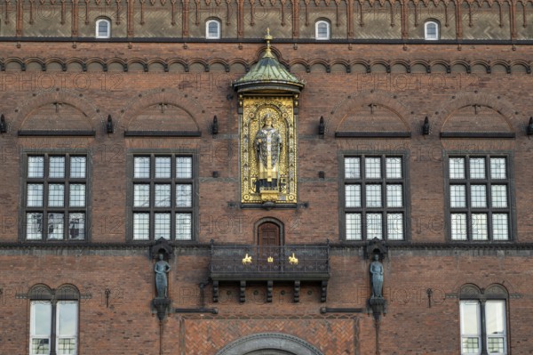 Brick façade with gilded sculpture of Bishop Absalon, Town Hall in the National Romantic style by Martin Nyrop, Town Hall Square, Rathausplatz or Rådhuspladsen, Copenhagen, Denmark, Europe