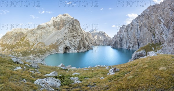 Turquoise mountain lake Kol Suu with rocky steep mountains, Kol Suu Lake, Sary Beles Mountains, Naryn Province, Kyrgyzstan, Asia