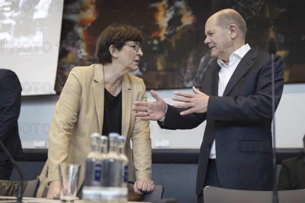 Olaf Scholz (SPD), Federal Chancellor speaks with Saskia Esken, Federal Chairwoman of the SPD, recorded during the SPD parliamentary group meeting in Berlin, 12 March 2024