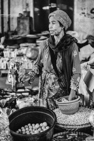Traditional authentic food market, seller, woman, fruit, vegetable, fresh, food, nutrition, sale, trade, bazaar, authentic, disease vector, food law, food control, stall, asian, vegetable market, local, hygiene, virus, tradition, traditional, health, marketplace, market hall, tropical, travel, tourism, culture, poverty, presentation, cleanliness, person, muslim, islam, black and white, monochrome, Lombok, Indonesia, Asia