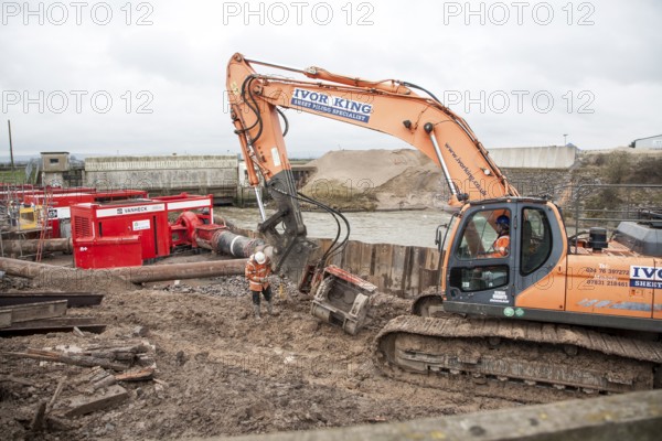 Engineering work on flood defences on the King's Sedgemoor Drain river at Dunball, near Bridgwater, Somerset, England, February 2013