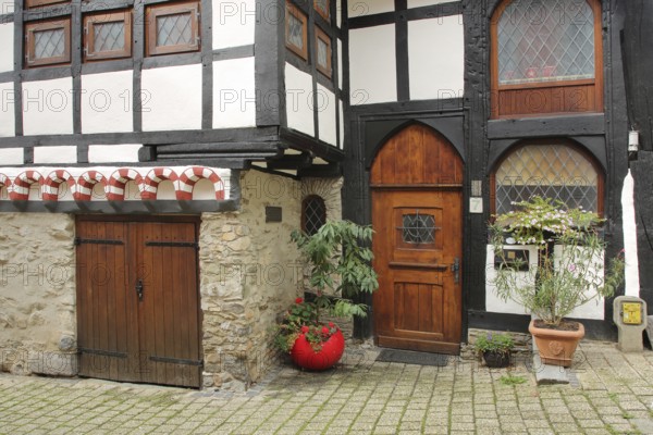Half-timbered house built in 1292 with wooden door and decoration, Bergstraße, Old Town, Limburg, Hesse, Germany, Europe