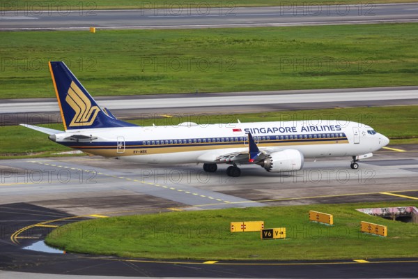 A Boeing 737 MAX 8 aircraft of Singapore Airlines with the registration 9V-MBK at Changi Airport, Singapore, Asia