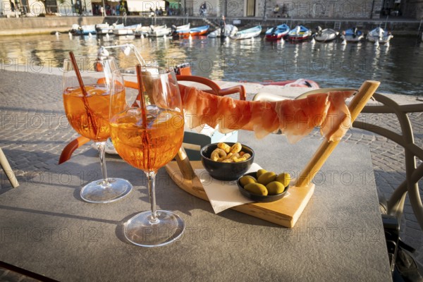 Aperol with ham, olives, Mediterranean, bistro, snack, restaurant, gastronomy, bar, drink, alcohol, enjoyment, holiday, travel, Italy, Europe