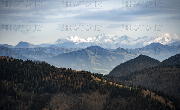 View of the Alpine foothills and main Alpine ridge with snow-covered peaks, summit of the Hohe Tauern with Großvenediger, from the Austrian Schinder, Bavarian Alps, Mangfall mountains, Bavaria, Germany, Europe