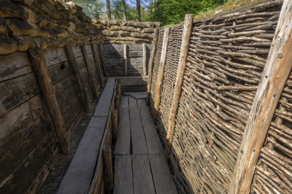German WW1 trench showing fire step, wooden duckboards and woven wickerwork branches at the Passchendaele Museum, Zonnebeke, West Flanders, Belgium, Europe