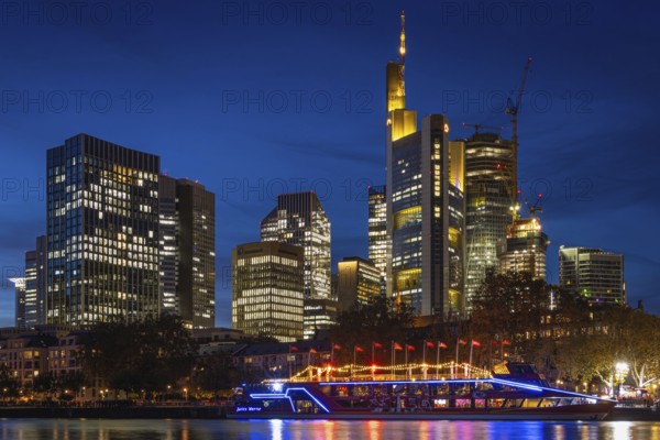 The Kansas City Chiefs' NFL boat is anchored on the River Main in front of Frankfurt's banking skyline. On Sunday, 5 November 2023, the Chiefs' football team led by quarterback Patrick Mahomes will face the Miami Dolphins in Frankfurt's Waldstadion, Mainufer, Frankfurt am Main, Hesse, Germany, Europe
