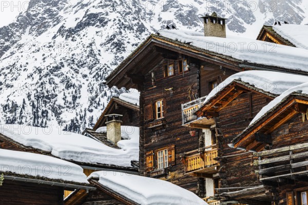 Old snow-covered wooden houses in the historic village centre, Grimentz, Val d'Anniviers, Valais Alps, Canton Valais, Switzerland, Europe