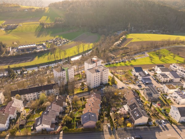 Aerial view of a residential area with river and fields in a rural area in the morning light, Nagold, Black Forest, Germany, Europe