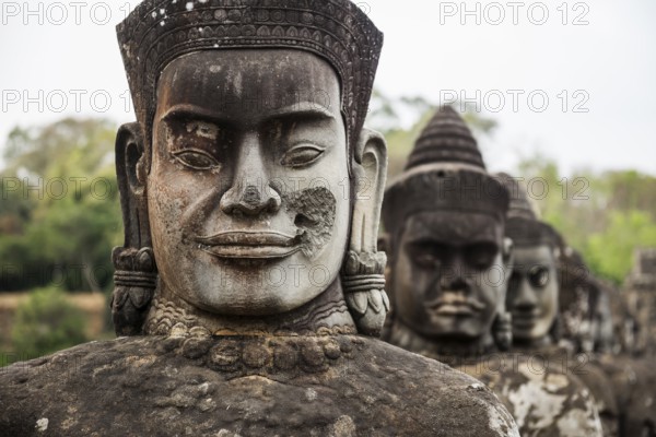 Figures on the bridge to Angkor Thom, sunset, Angkor Wat, Angkor, UNESCO World Heritage Site, Siem Reap, Cambodia, Indochina, Southeast Asia, Asia