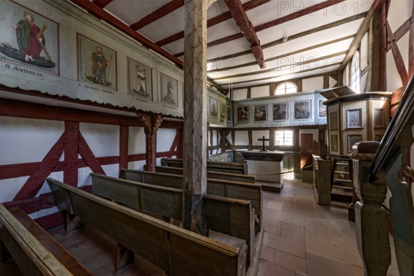 Historic half-timbered church, interior with wooden benches, altar and pulpit, church from Niederhörlen, Hessenpark Open-Air Museum, Neu-Anspach, Taunus, Hesse, Germany, Europe