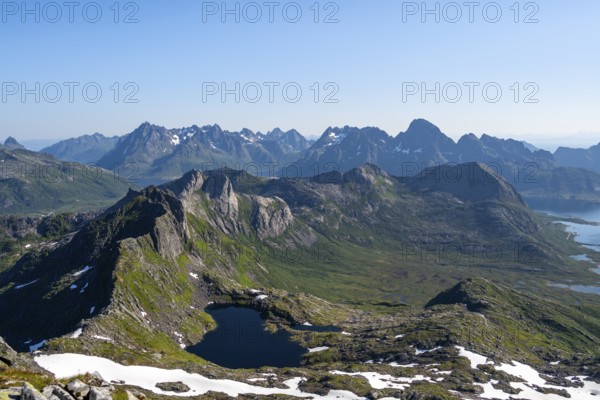 Mountains and fjord landscape, view from the summit of Rundfjellet, fjord Austenesfjord and lake Hellskarvatnet, Svolvaer, Nordland, Norway, Europe