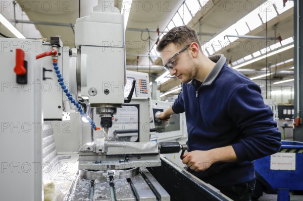 Remscheid, North Rhine-Westphalia, Germany - Trainees in metal professions, here at a machine tool, Vocational Training Centre of the Remscheid metal and electrical industry. - FOR EDITORIAL USE ONLY!