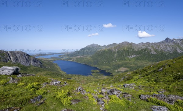 View of mountain landscape and valley with lakes, hiking trail to the summit of Rundfjellet, Svolvaer, Nordland, Norway, Europe
