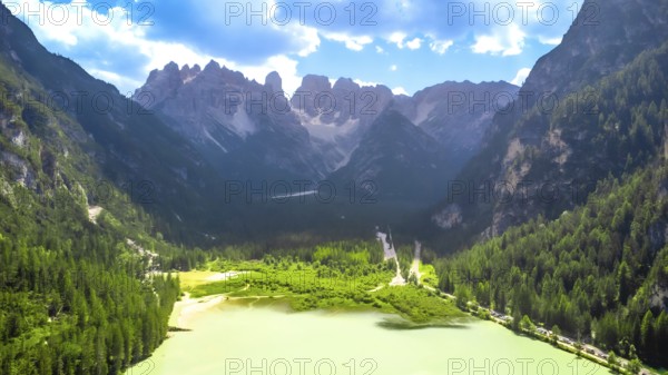 Breathtaking aerial view of lago di landro, or durrensee lake, surrounded by the stunning dolomites in south tyrol, italy