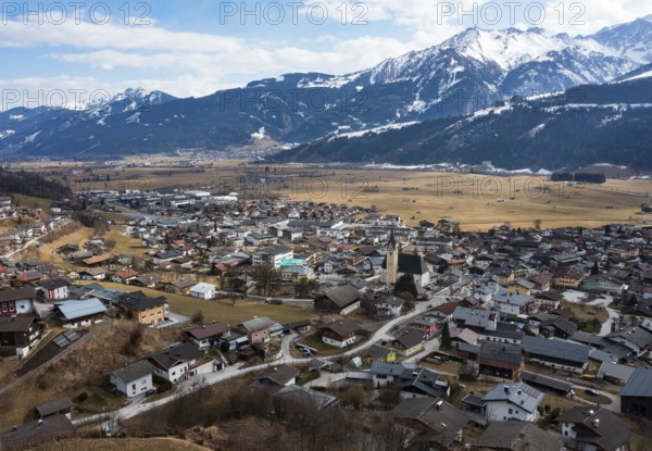Drone shot, view of village with parish church, Piesendorf, Pinzgau, Salzburg province, Austria, Europe