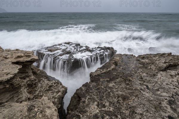 Waves on rocky coast, Playa Los Escullos, Cabo de Gata, Los Escullos, Playa del Arco, El Arco beach, Cabo de Gata-Nijar Natural Park, Almeria, Andalusia, Spain, Europe