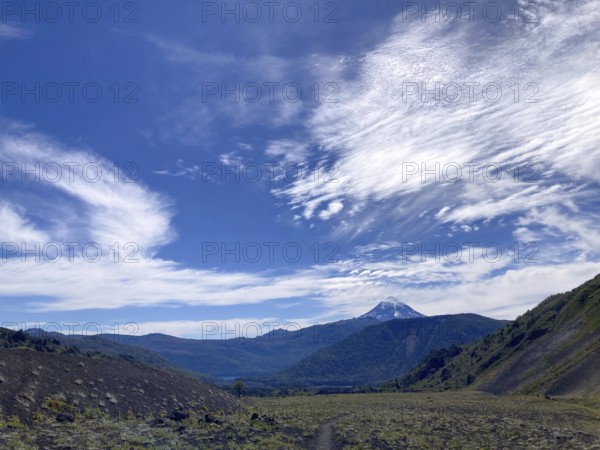 View from the lava field of the Achen Niyeu volcano to the Lanin volcano in Lanin National Park, Patagonia, Argentina, South America