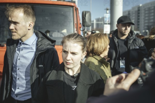 Bodyguards and Beatrix von Storch (in the background) at the final rally of Beatrix von Storch and the AfD in the Bundestag election campaign in Lichtenberg, Berlin, Germany, Europe