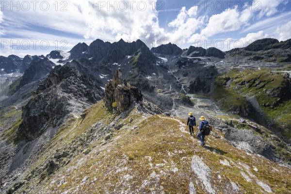 Two climbers on a mountain ridge, ascent to the summit of Mont de la Blana, view of rocky mountain landscape, Hérménence, Valais Alps, Valais, Switzerland, Europe