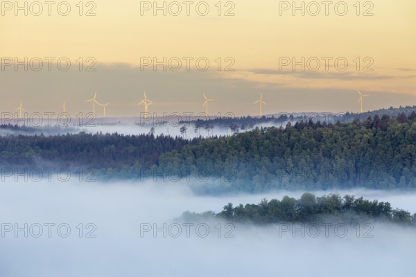 Wind turbines in the morning light, fog, Danube valley, mixed forest, Bandfelsen, Leibertingen, Upper Danube nature park Park, Baden-Württemberg, Germany, Europe