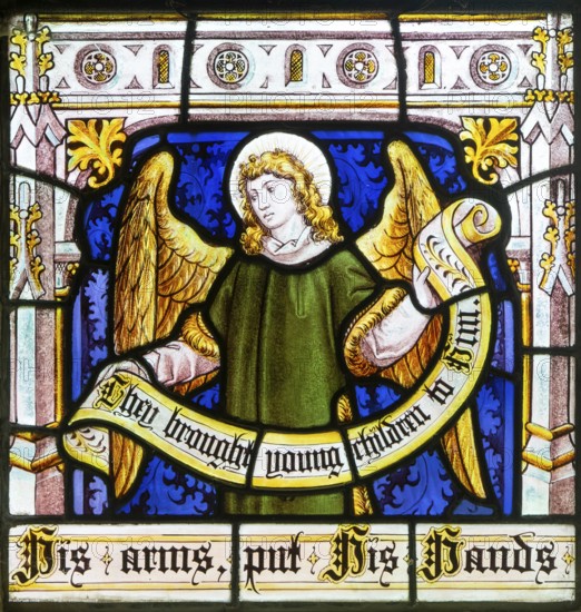 Detail of angel on stained glass window 'Suffer the Little Children' by Burlison & Grylls c 1880, Kelsale church, Suffolk, England, UK