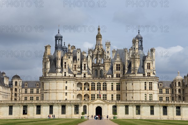 Close-up of a magnificent castle with detailed decorations and high towers under a slightly cloudy sky, Chambord Castle, Château de Chambord, Loire Castle, Loire Valley, Loir-et-Cher Department, Centre Region, France, Europe