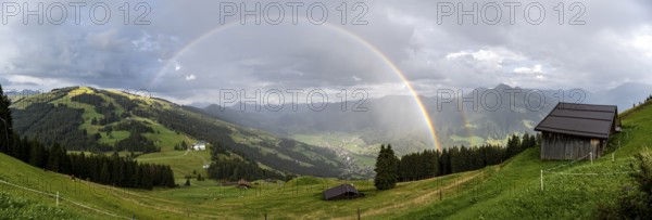 View over the Brixen Valley with rainbow, Hochbrixen, Brixen im Thale, Kitzbühel Alps, Tyrol, Austria, Europe