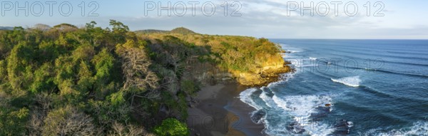 Aerial view, rainforest, sandy beach and coast with waves, Playa Cocalito, Puntarenas, Costa Rica, Central America