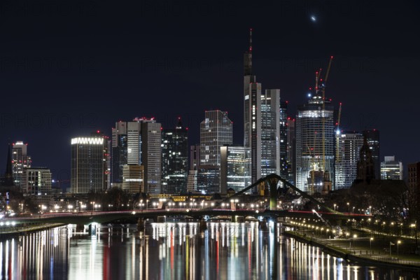 30 hrs and 21:30 hrs, only in greatly reduced form., Deutschherrnbrücke, Frankfurt am Main, Hesse, Germany, On the occasion of Earth Hour 2023, the lights of Frankfurt's banking skyline will shine on the evening of 25 March 2023, between 20, Europe
