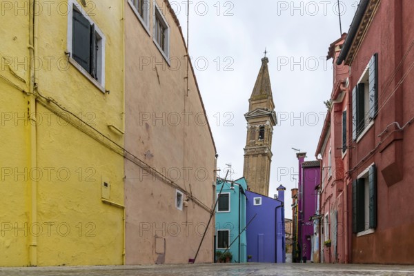 City view of Burano with colourfully painted houses and canals. Slate church tower Campanile, Burano, Venice, Venezia, Italy, Europe