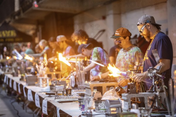 Detroit, Michigan, Artists create glass and other artworks at the Michigan Glass Project's annual show. The event raises money to support art education in Detroit-area schools