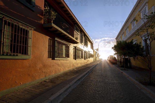 Mexico, Mazatlan, Colorful old city streets in historic city center near El Malecon and ocean shore, Central America