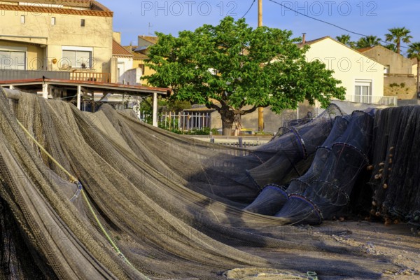 Fishing nets at the harbour of Meze, Mèze, on the Etang Thau, Département Hérault, Region Provence-Alpes-Côte d'Azur, France, Europe