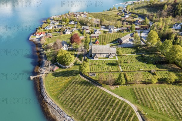 Aerial view of church and apple orchards, Ullensvang near Lofthus, Hardangerfjord, Norway, Europe