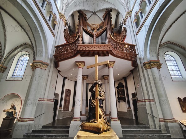 Interior view of Bonn Minster, bronze statue of St Helena with Klais organ in the west apse, Bonn, North Rhine-Westphalia, Germany, Europe