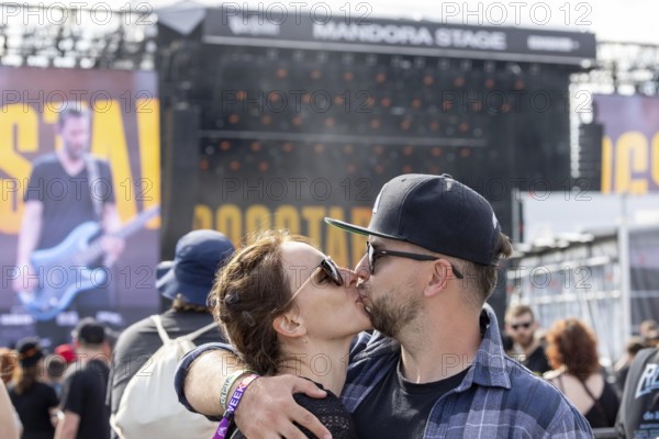 Adenau, Germany, 8 June 2024: Fans enjoy Dogstar (bass, Keanu Reeves) at Rock am Ring. The festival takes place at the Nürburgring race track near the town of Adenau from 7 - 9 June 2024, Europe