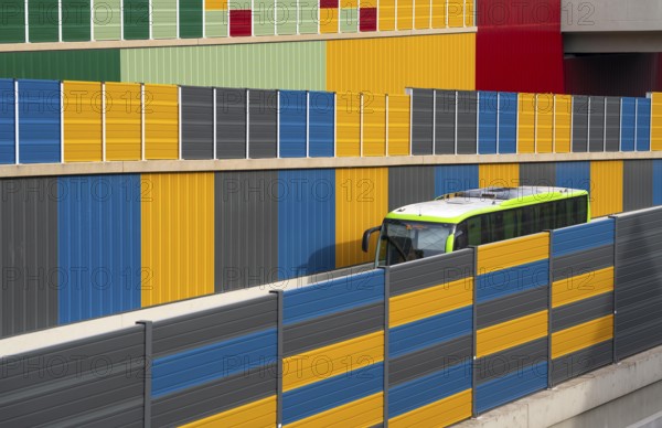 Colourful noise barriers on the A52 motorway, at the Essen-Rüttenscheid junction, the noise barriers were rebuilt in a colourful design as part of the motorway renovation, North Rhine-Westphalia, Germany, Europe