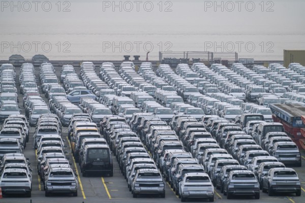 Parking space for import vehicles, hundreds of Hyundai Ioniq, electric cars, waiting for onward transport, at the EUROGATE container terminal in the overseas harbour of Bremerhaven, Lower Saxony, Germany, Europe