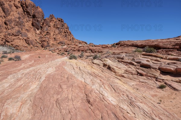 Layered rock formations along the Fire Wave Trail at Valley of Fire State Park near Overton, Nevada
