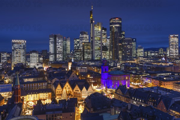 St Paul's Church in Frankfurt am Main will be illuminated in blue in the middle of the Christmas market on 10 December 2024, International Human Rights Day. This commemorates the declaration of the UN Human Rights Charter of 10 December 1948. Frankfurt am Main, Römerberg, Hesse, Germany, Europe