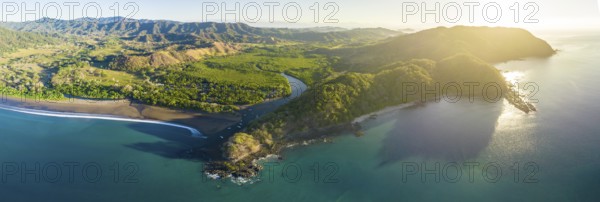 Aerial view, coastal landscape at sunset with mountains and forest, Pochote, Puntarenas, Costa Rica, Central America